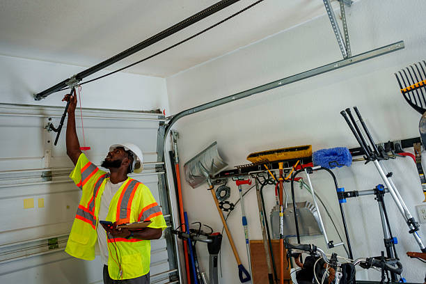 Professional Garage Door Panel Replacement technician working in Kingsford, MI